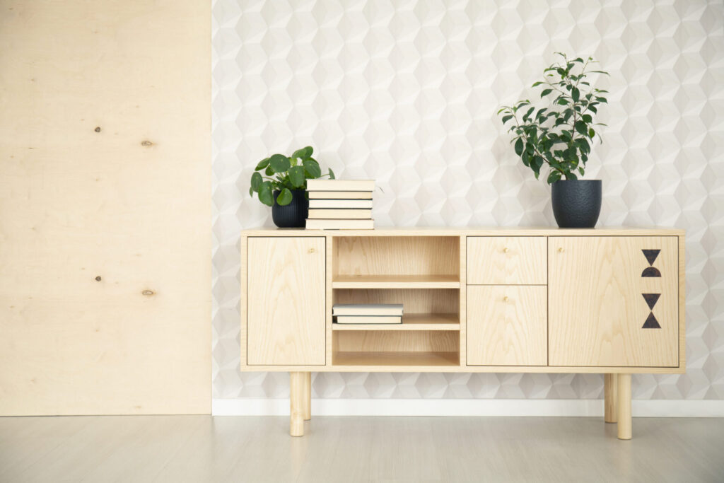 CNC Cutting wooden cupboard in minimal living room interior